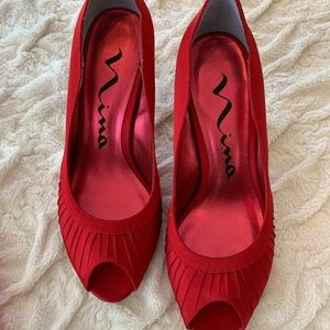 Red satin Nina peep toe pumps.  No box. Never been worn. Size 8  with dust bag